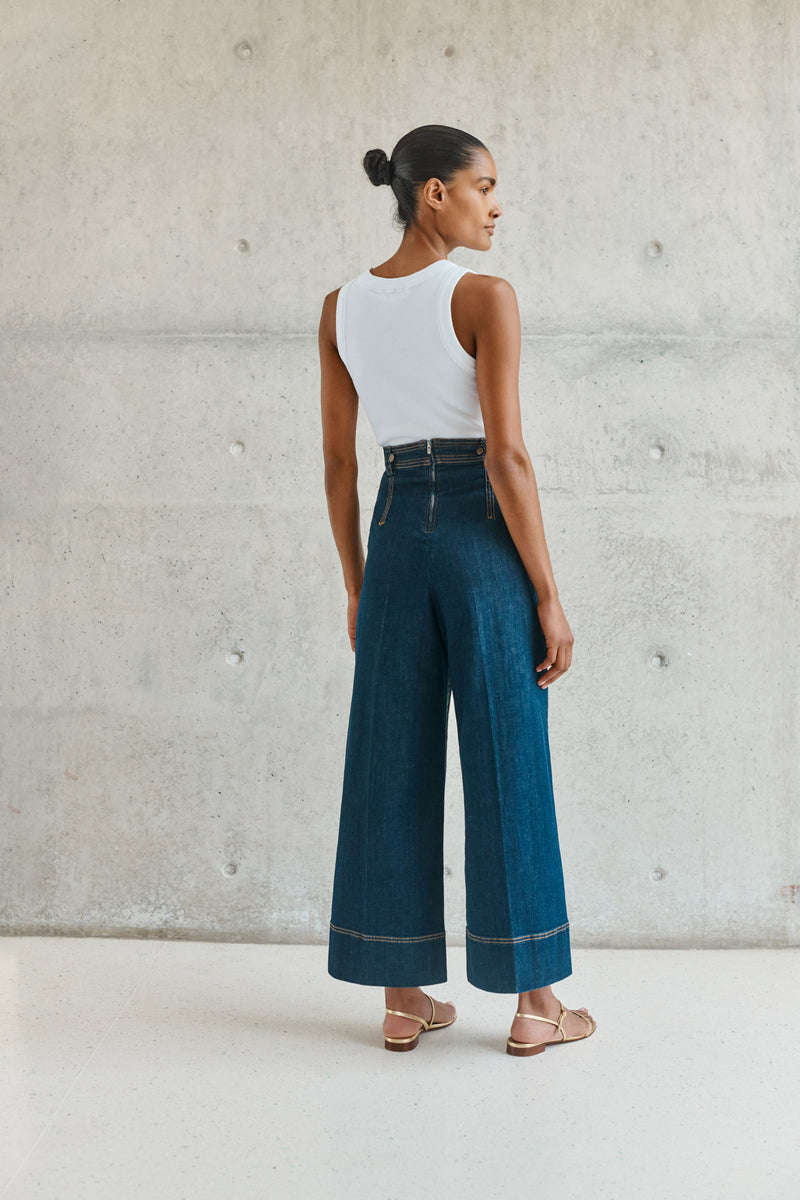 Wiggy Kit | The Inside Stripe Jean | Model wearing high waisted dark Indigo jeans