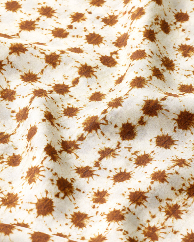 Wiggy Kit | Sarong | Close up of brown Batik patterned Sarong