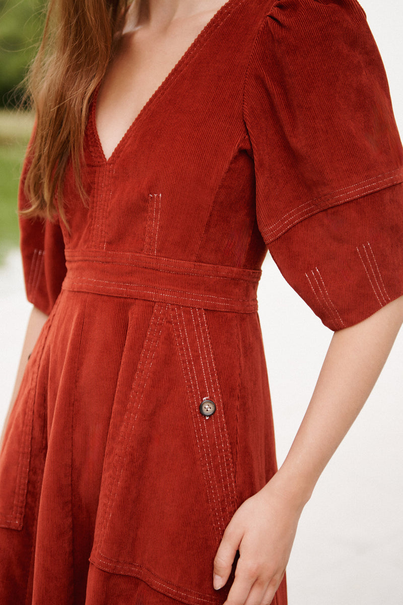 Wiggy Kit | Lantern Dress | Model Wearing Red Lantern Dress with Black Boots