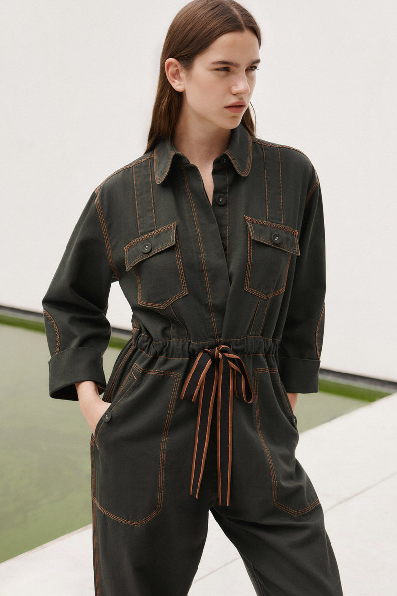 Wiggy Kit | The Milano Jumpsuit in Dark Green | Model Wearing Dark Green Jumpsuit