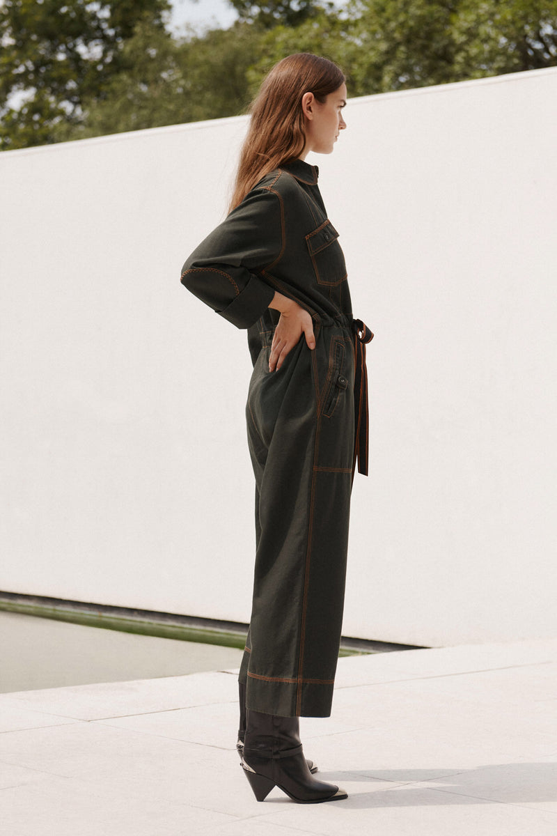 Wiggy Kit | The Milano Jumpsuit in Dark Green | Model Wearing Dark Green Jumpsuit