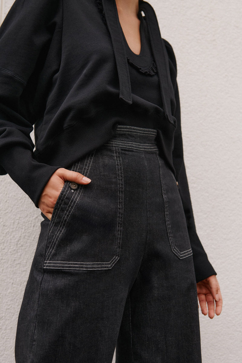 Wiggy Kit | The Jean in Black | Model Wearing Jeans with Black Top