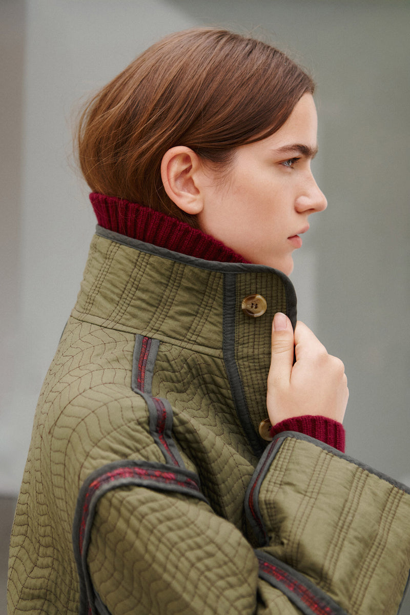Wiggy Kit | Reversible Quilted Coat | Model Wearing Reversible Quilted Coat in Green Print