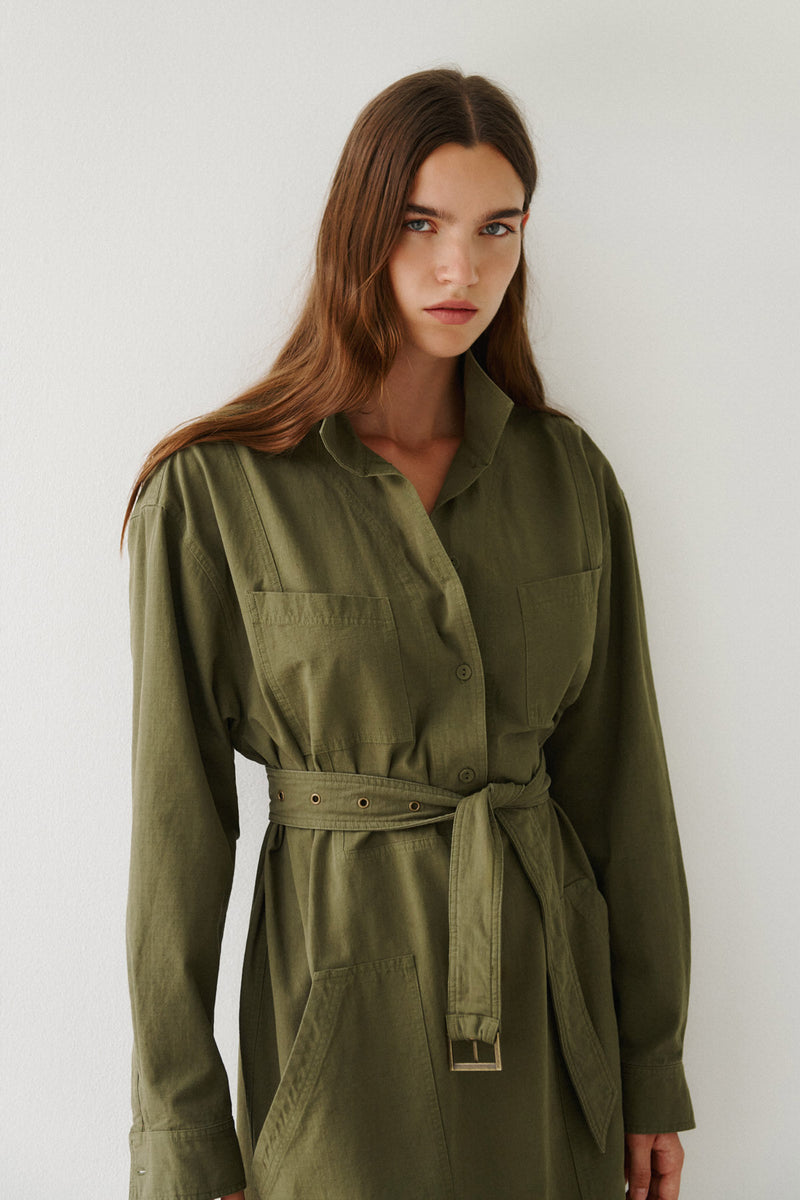 Wiggy Kit | Ripstop Surplus Dress in Green | Model Wearing Maxi Ripstop Surplus Dress in Green