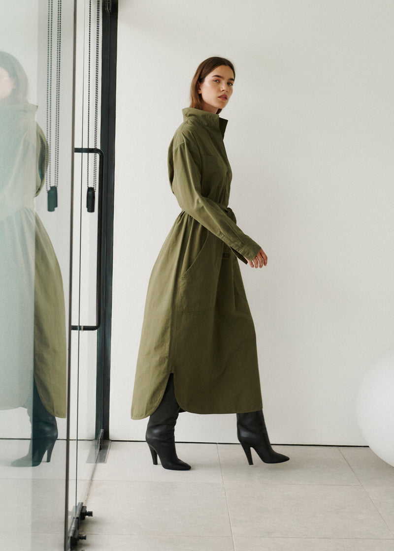 Wiggy Kit | Ripstop Surplus Dress in Green | Model Wearing Maxi Ripstop Surplus Dress in Green