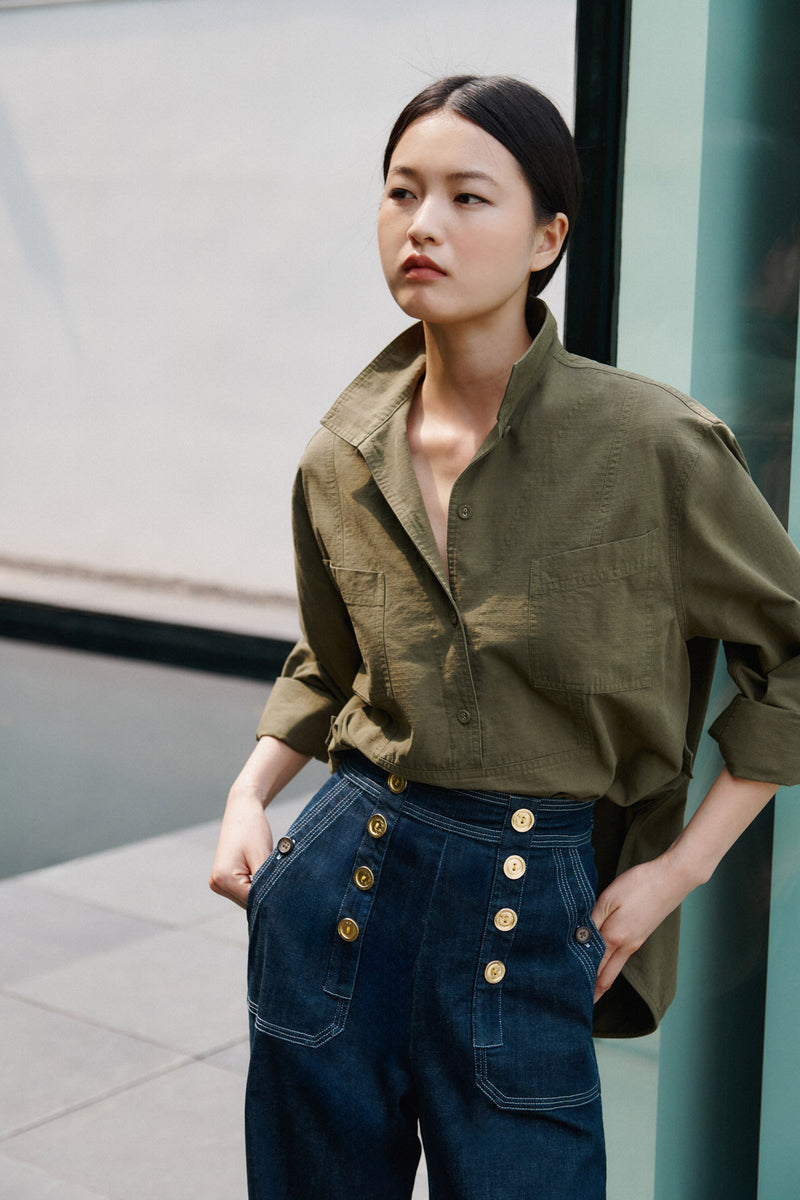 Wiggy Kit | The Sailor Jean in Indigo | Model Wearing Jeans and Green Top