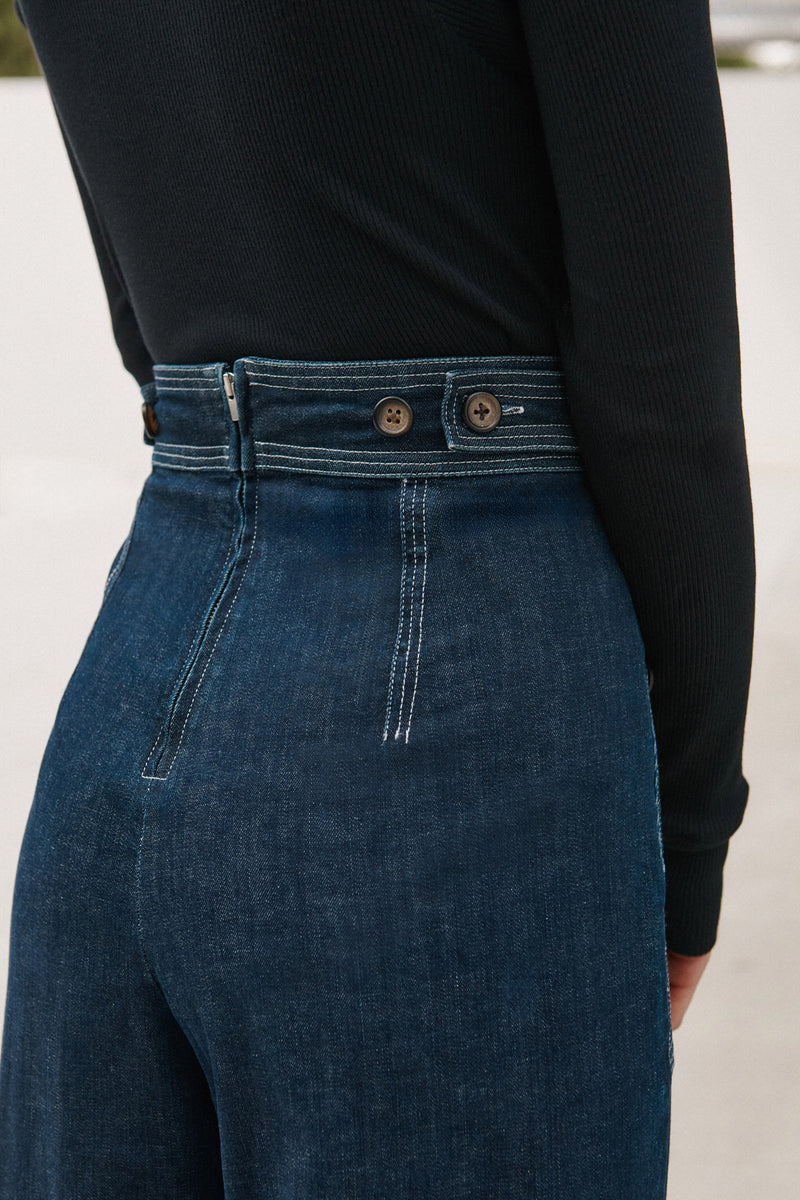 Wiggy Kit | The Sailor Jean in Indigo | Model Wearing Jeans and Black Top