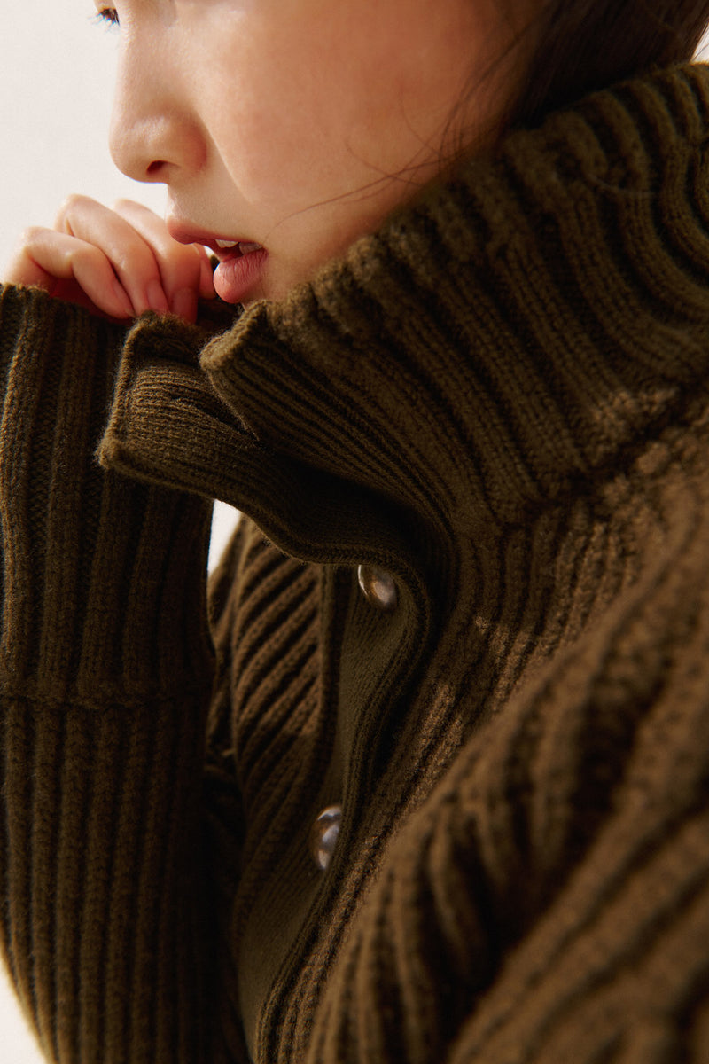 Wiggy Kit | Ribbed High Neck Jacket in Green | Model Wearing Ribbed High Neck Jacket