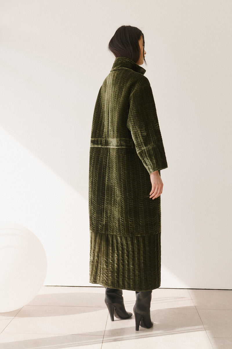 Wiggy Kit | The Velvet Quilted Coat in Dark Green | Model Wearing Long Green Coat