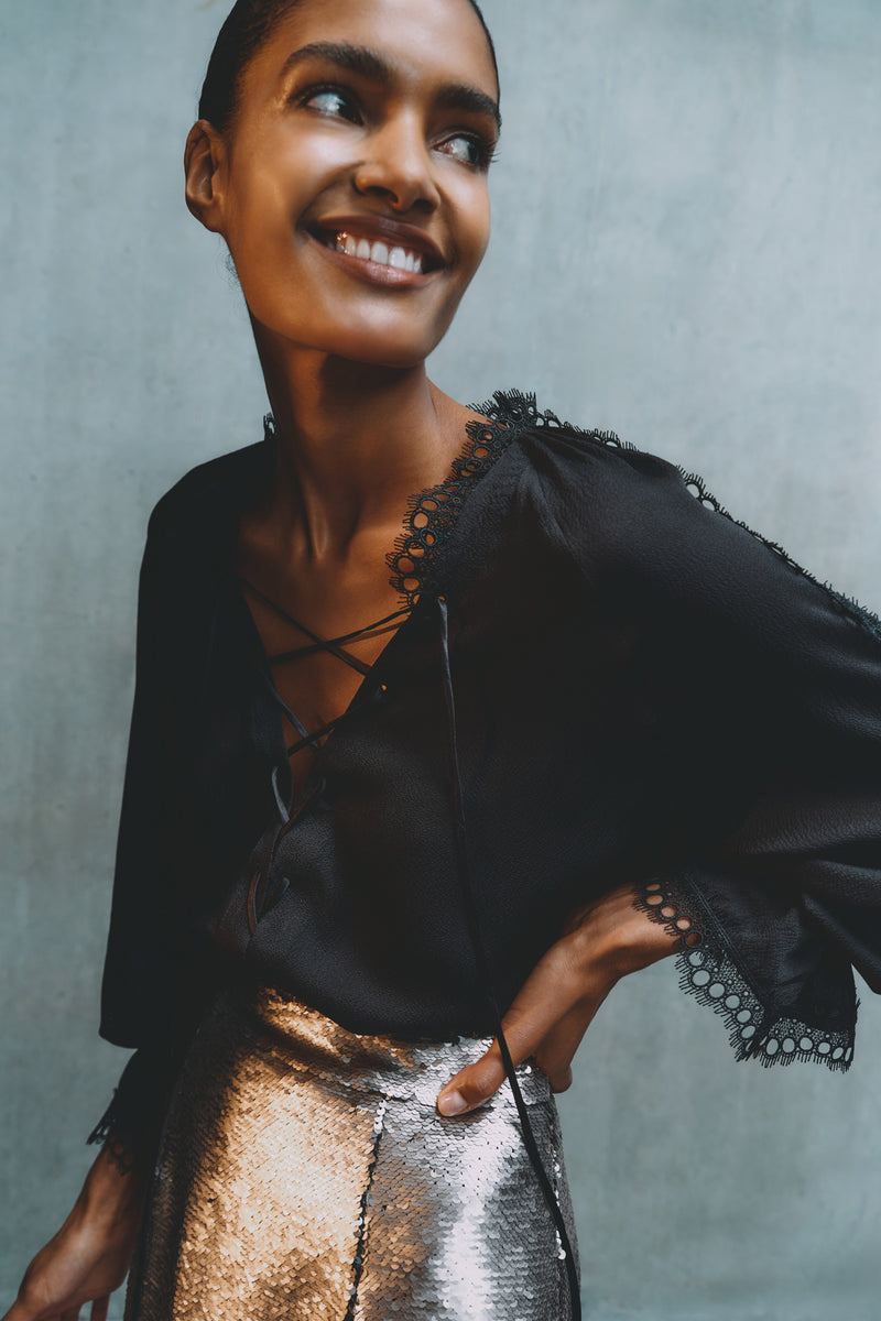 Wiggy Kit | Pirate Shirt in Black | Model Wearing Black Blouse with Long-Sleeves