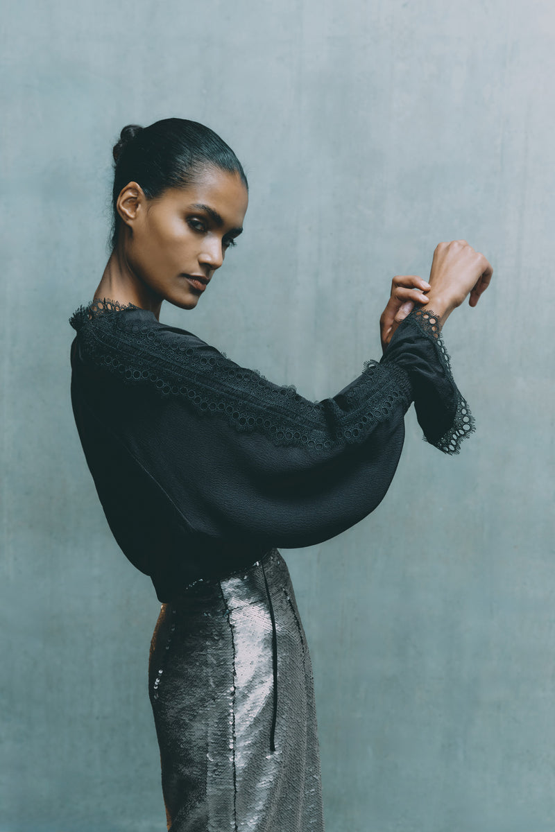 Wiggy Kit | Pirate Shirt in Black | Model Wearing Black Blouse with Long-Sleeves