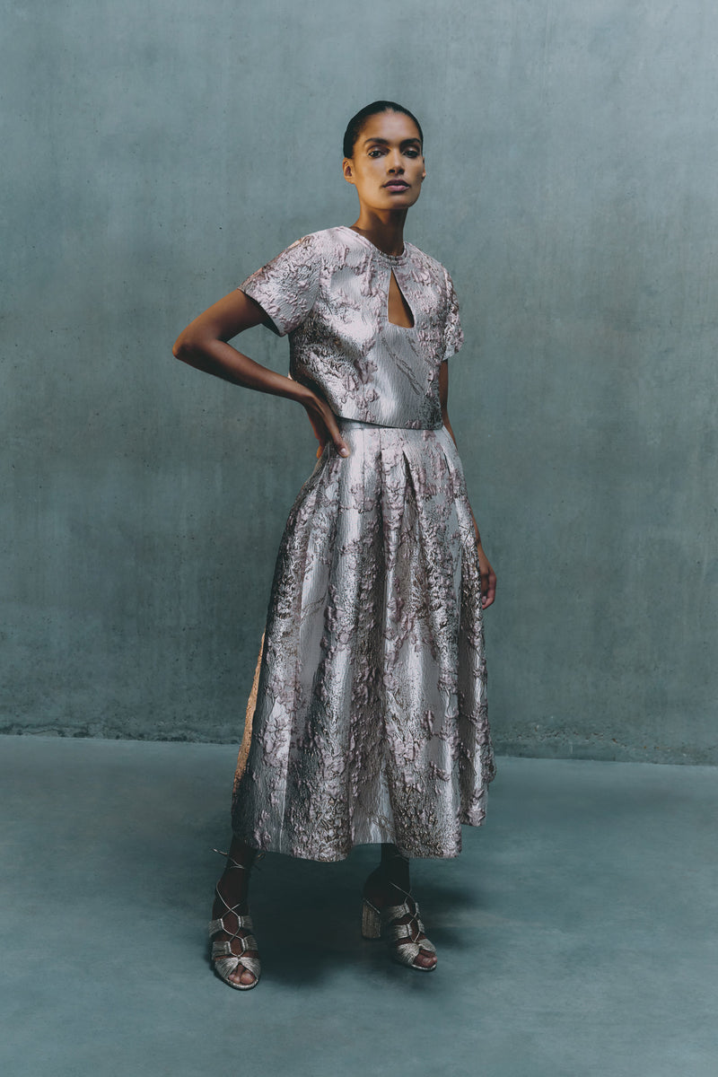 Wiggy Kit | Sputnik Top | Model Wearing Top in Silver with Floral Inspired Detailing