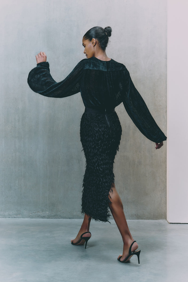 Wiggy Kit | Eva Skirt- Fringed | Model Wearing Black Fringed Pencil Skirt
