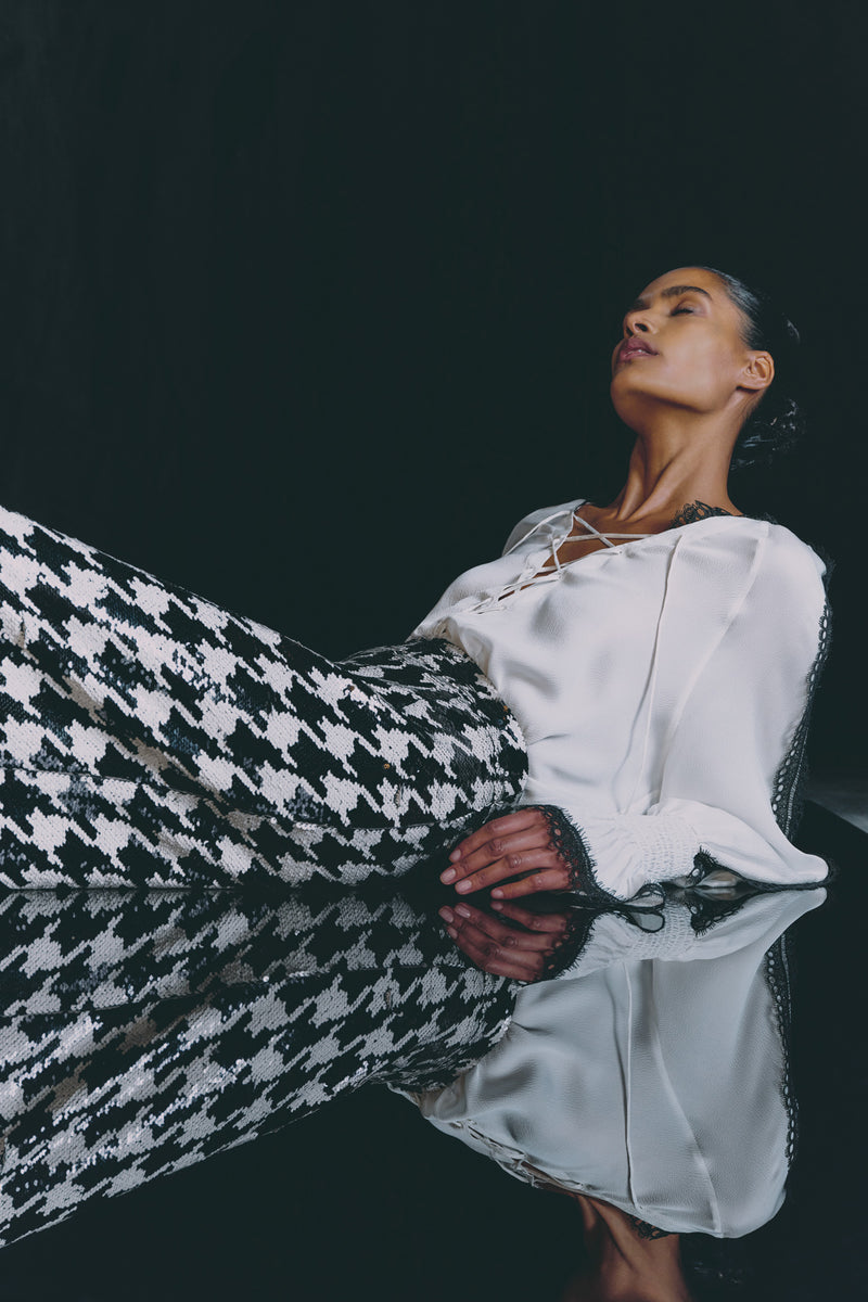 Wiggy Kit | Eva Skirt- Houndstooth Sequin | Model Wearing Black and White Skirt