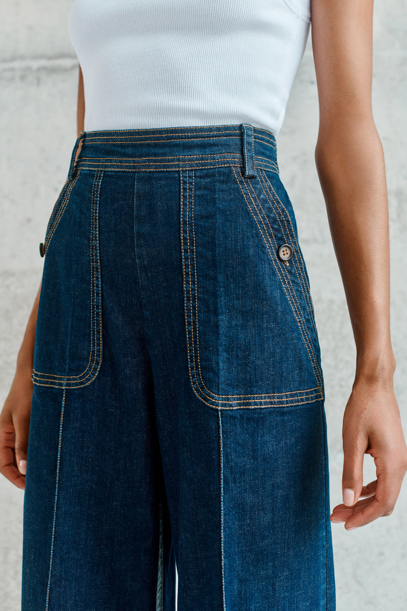 Wiggy Kit | The Inside Stripe Jean | Model wearing high waisted dark Indigo jeans