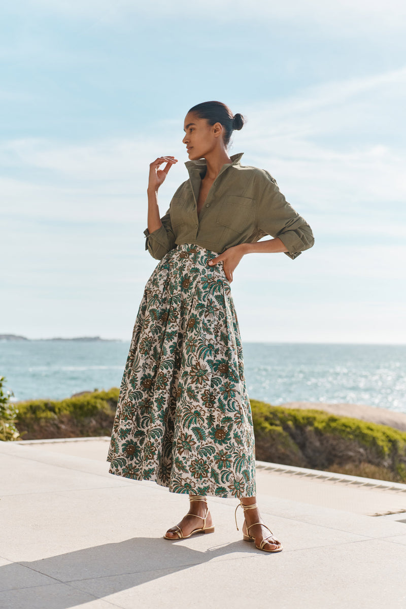 Wiggy Kit | The Friday Skirt | Model wearing jungle print midi skirt with green shirt