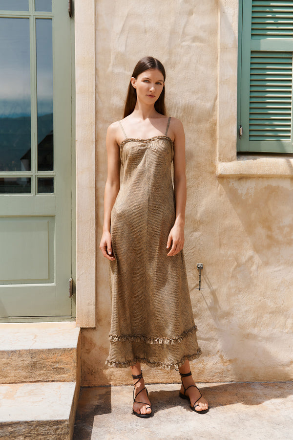 Wiggy Kit | Silk Bias Slip Dress | Model wearing brown slip dress with stripe print