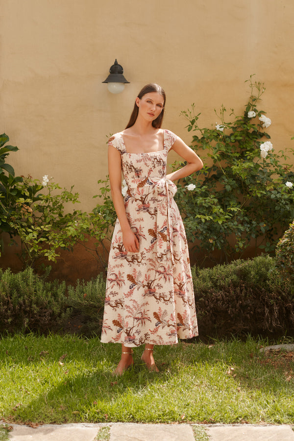 Wiggy Kit | The Clover Dress | Model wearing cream and pink floral print midi dress