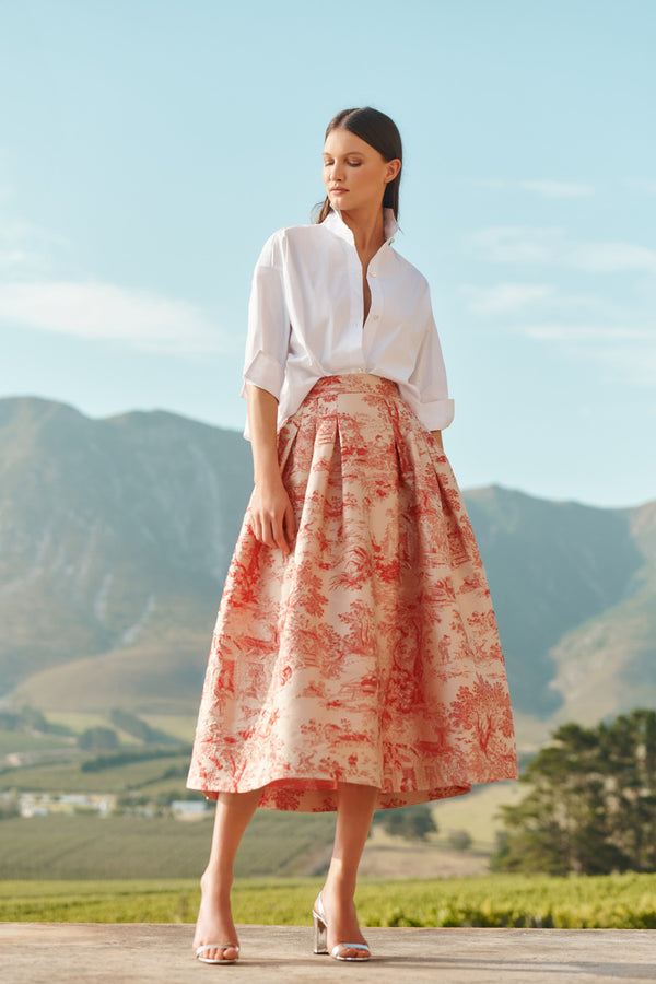 Wiggy Kit | Opera Skirt (Toile De Jouy) | Model wearing patterned skirt with white shirt