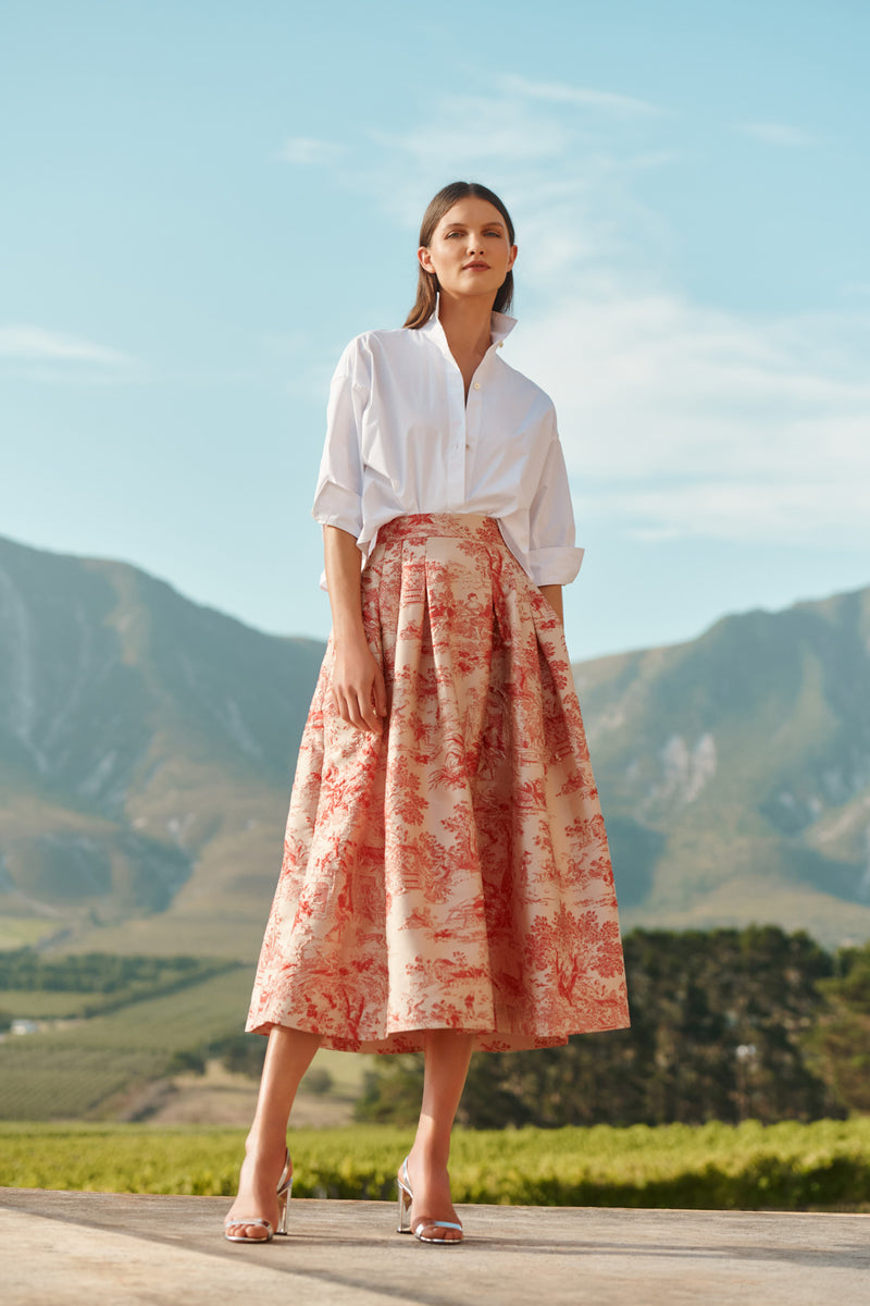 Wiggy Kit | Opera Skirt (Toile De Jouy) | Model wearing patterned skirt with white shirt