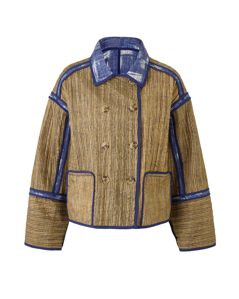 Wiggy Kit | Quilted Double-Breasted Jacket | Product image of reversible tan patterned jacket