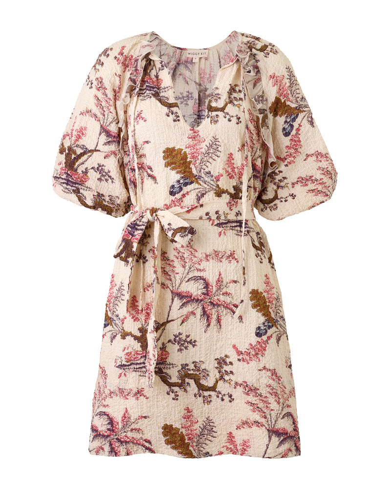 Wiggy Kit | Bubble Dress Palm Print | Product image of floral patterned pink and cream dress