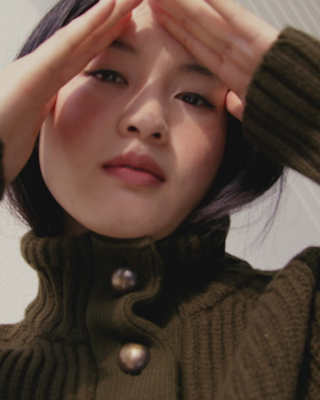 Wiggy Kit | Ribbed High Neck Jacket in Green | Video of Model Wearing Ribbed High Neck Jacket with Jeans