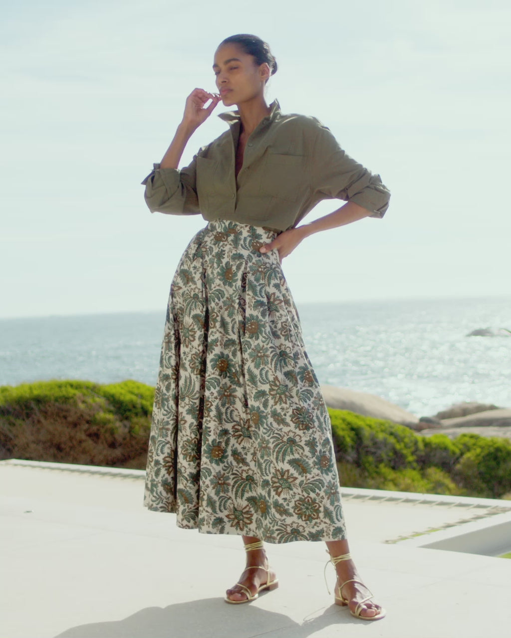 Wiggy Kit | The Friday Skirt | Video of model wearing jungle print midi skirt with green shirt