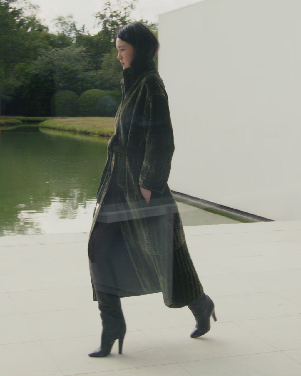 Wiggy Kit | The Velvet Quilted Coat in Dark Green | Video of Model Wearing Long Green Coat