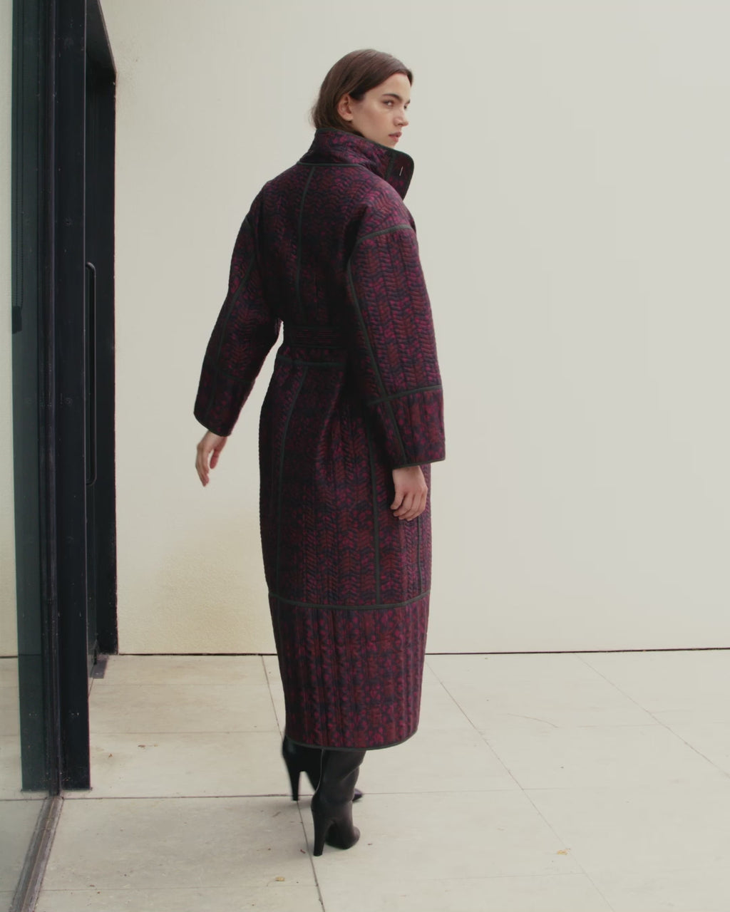 Wiggy Kit | Reversible Quilted Coat | Video of Model Wearing Reversible Quilted Coat in Pink and Black Print
