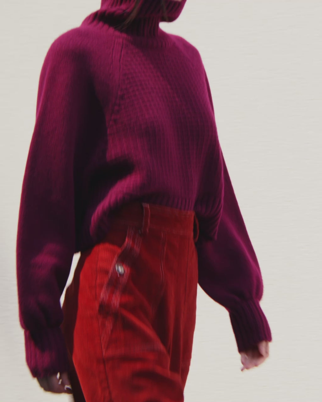 Wiggy Kit | Waffle Turtleneck in Dark Red | Video of Model Wearing Dark Red Jumper and Patterned Skirt