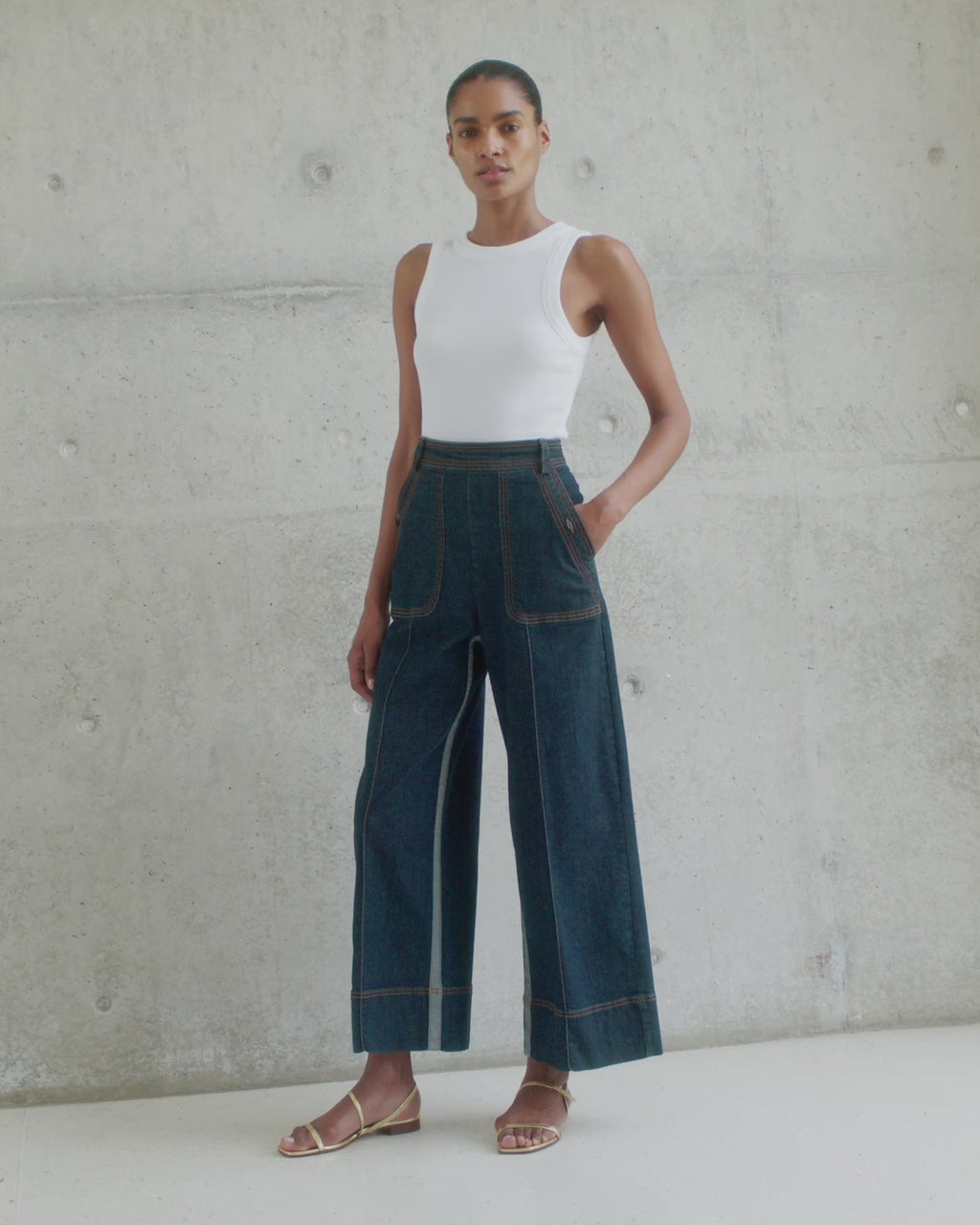 Wiggy Kit | The Inside Stripe Jean | Video of model wearing high waisted dark Indigo jeans