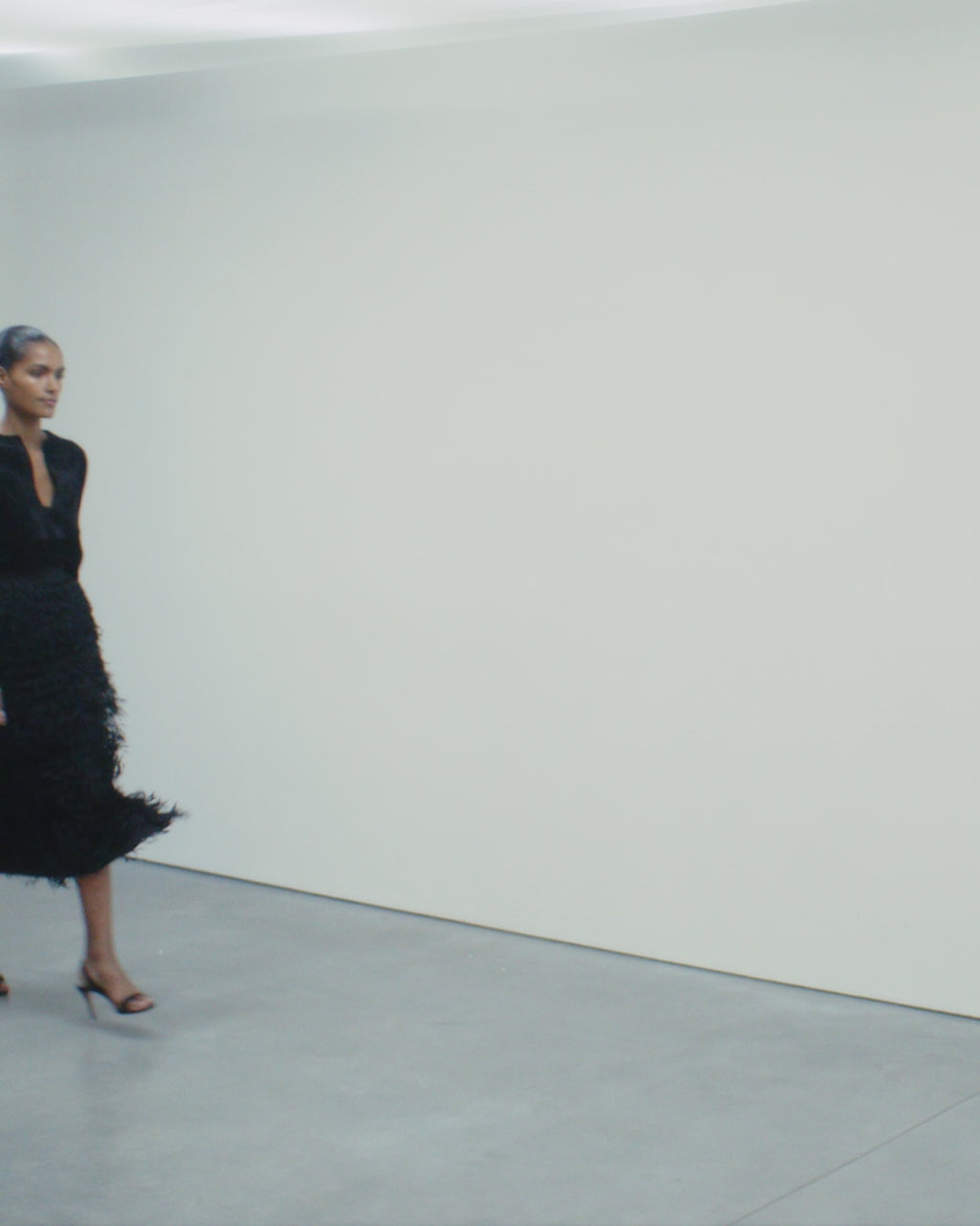 Wiggy Kit | Eva Skirt- Fringed | Video of Model Wearing Black Fringed Pencil Skirt