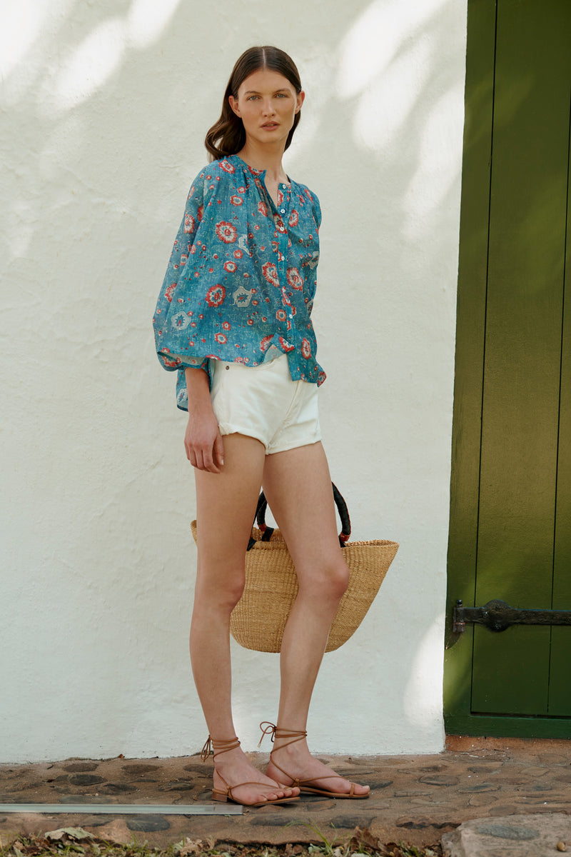 Wiggy Kit | Pampas Shirt in Blue Floral Print | Lifestyle Image, Front of Shirt