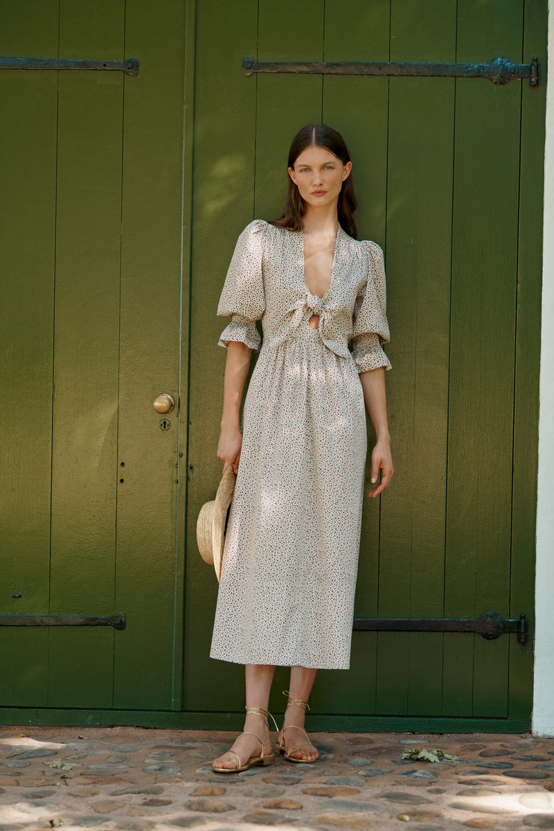 Wiggy Kit | Bunny Dress in Brown Animal Print | Lifestyle Image, Front of Dress